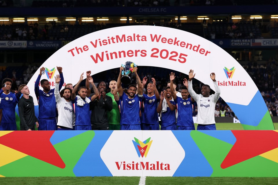 Chelsea players lift the VisitMalta Weekender 2025 trophy.