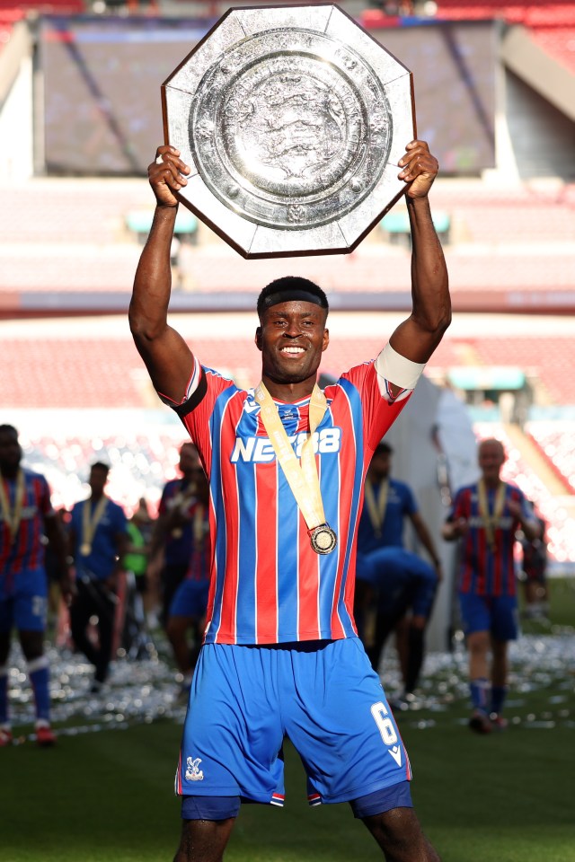 Marc Guehi of Crystal Palace lifts the FA Community Shield trophy.