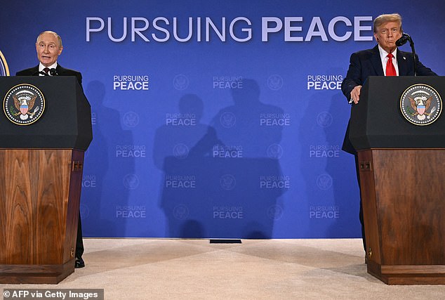US President Donald Trump and Russian President Vladimir Putin deliver a joint press conference after participating in a US-Russia summit on Ukraine