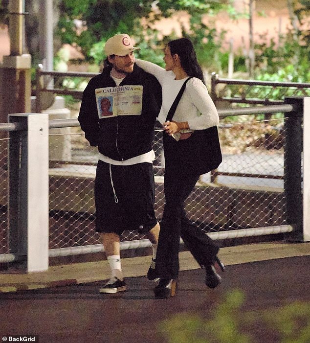 While his parents and siblings lived it up together, Brooklyn and his wife Nicola Peltz have been seen for the first time since renewing their vows, as they enjoyed a late night stroll in New York on Wednesday