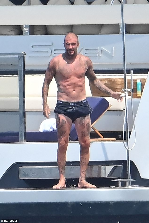 The Beckhams' fun continued on Wednesday as father David, 50, got into holiday mood by stripping down to his tiny swimwear to be photographed by son Cruz, 20, and wife Victoria, 51, on the summertime jaunt to St Tropez