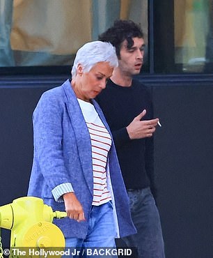 Though it's unclear why Denise was in tears, a source told TMZ: 'There was a family matter that Matty was consoling his mother about'