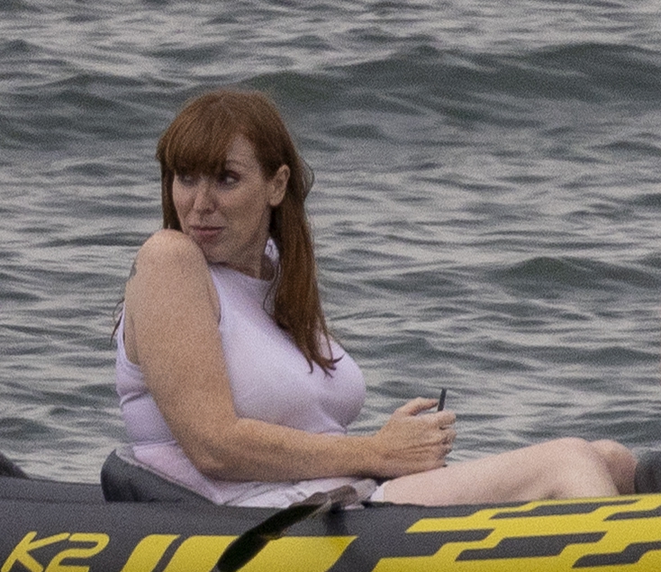 Angela Rayner in a rubber boat on the water.