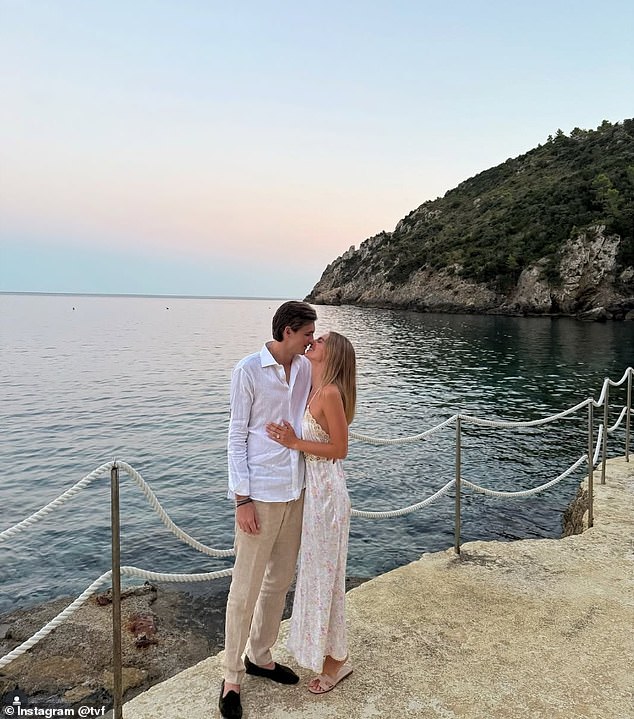Talita shared a stunning and intimate image of the two of them gazing at one another while standing by the ocean - with her glamorous sparkler on full view