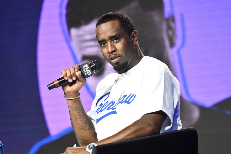 Sean "Diddy" Combs speaking at a REVOLT & AT&T Summit.