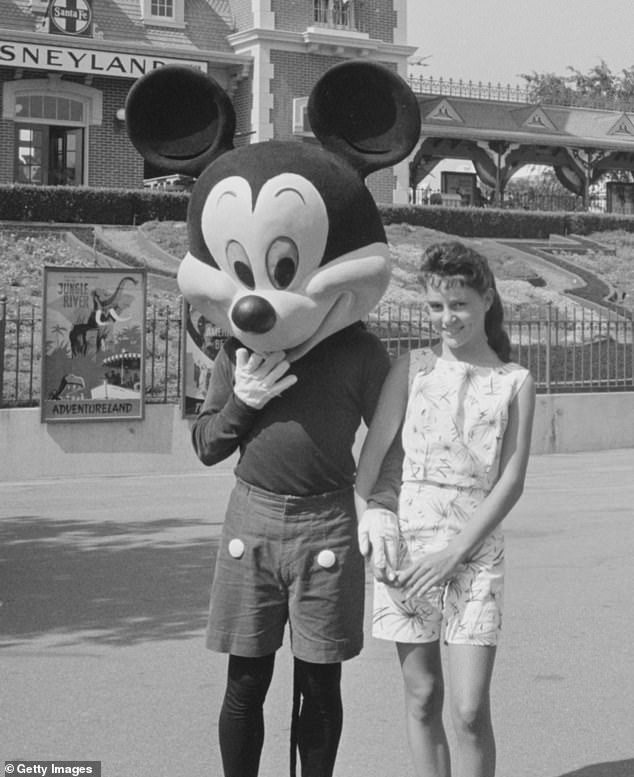 Disney fans are in shock after a photo revealed what characters looked like at the theme park in the 1950's and '60s. Mickey is seen in Disneyland in 1960