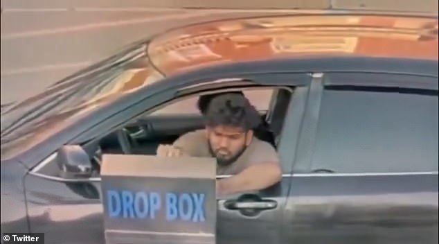 Surveillance video appears to show Councilman Abu Musa in the passenger seat of a vehicle as another man deposits three stacks of ballots at a city drop box just days before the primary election