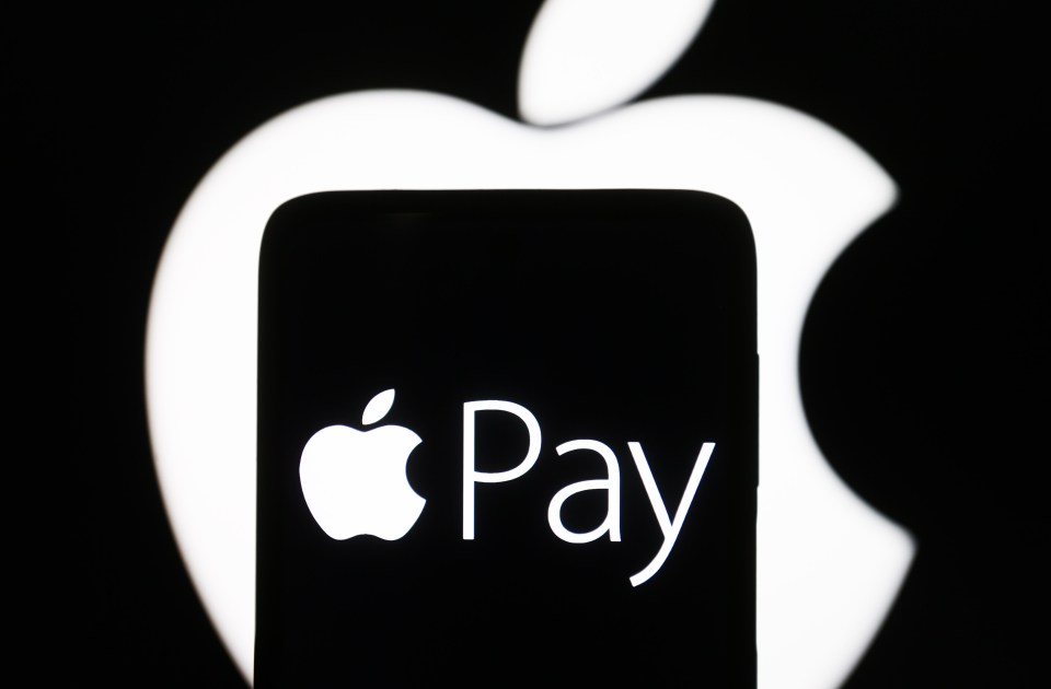 Photo illustration of the Apple Pay logo on a smartphone screen.
