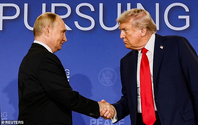 PICTURED: US President Donald Trump and Russian President Vladimir Putin shake hands during a press conference following their meeting to negotiate an end to the war in Ukraine, at Joint Base Elmendorf-Richardson, in Anchorage, Alaska, U.S., August 15, 2025