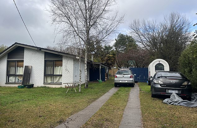 *Editors note, the image has been digitally altered to blur licence plates*A house where a woman and boy have been arrested in Porepunkah, Tuesday, August 26, 2025. A manhunt is underway after two police officers were shot dead and a third injured after being shot on a remote rural property in the town of Porepunkah. (AAP Image/Allanah Sciberras) NO ARCHIVING, IMAGE HAS BEEN DIGITALLY ALTERED TO BLUR LICENCE PLATES