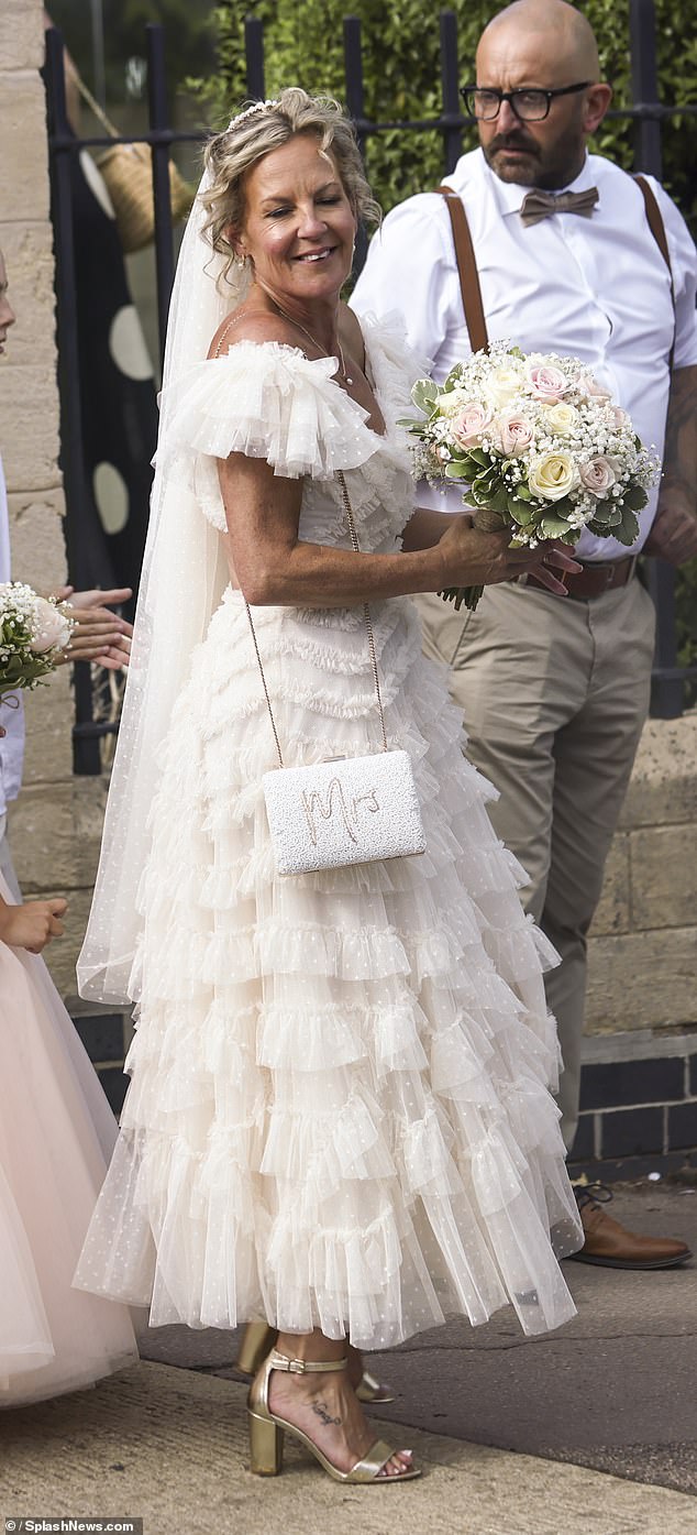 Lorraine Stanley, 49, looked sensational as she tied the knot with long-term partner Mark Perez in a picturesque country ceremony in Harpenden, Hertfordshire on Thursday