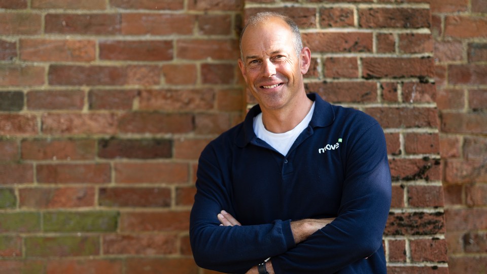 Phil Spencer, arms crossed, smiling.