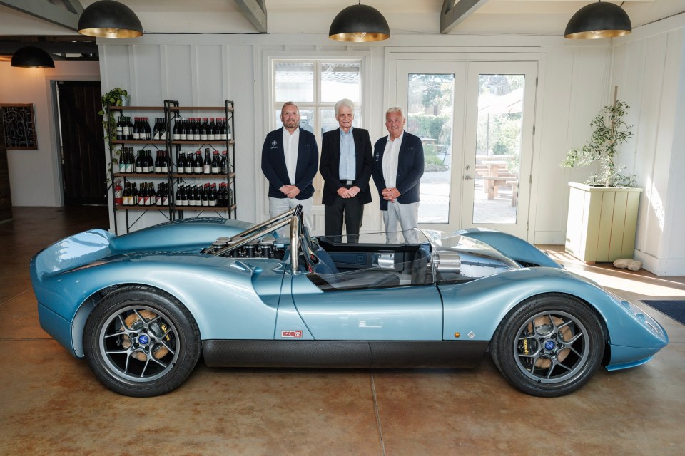 The Nichols Cars N1A ICON 88 supercar with three men standing behind it.