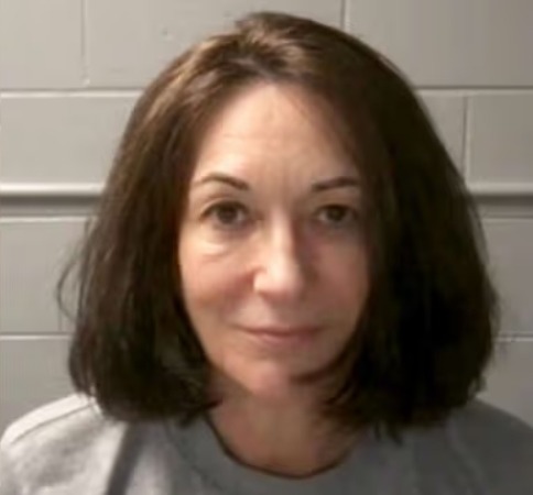Headshot of a woman with shoulder-length brown hair.