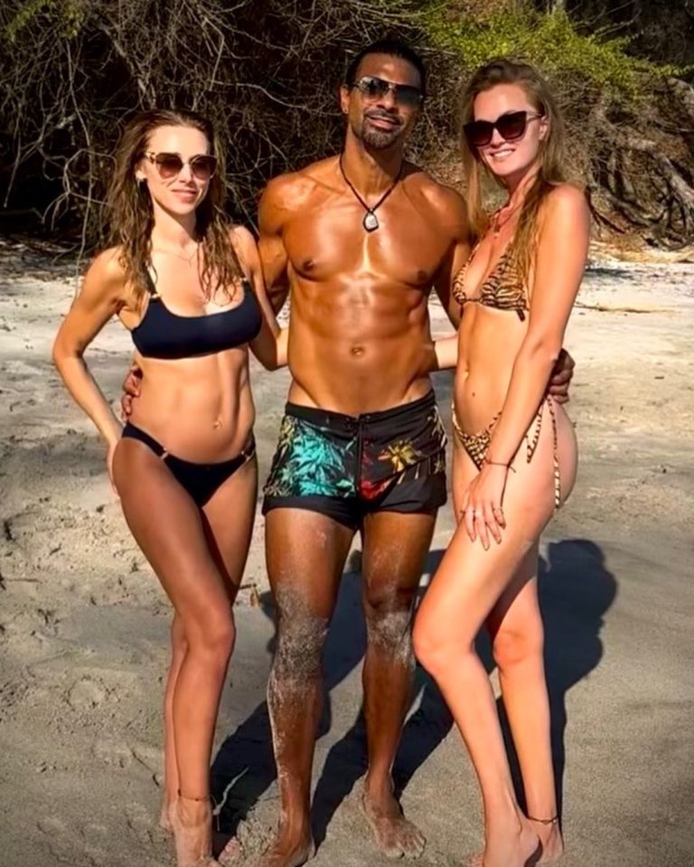 David Haye with Una Healy and Sian Osborne on a beach.