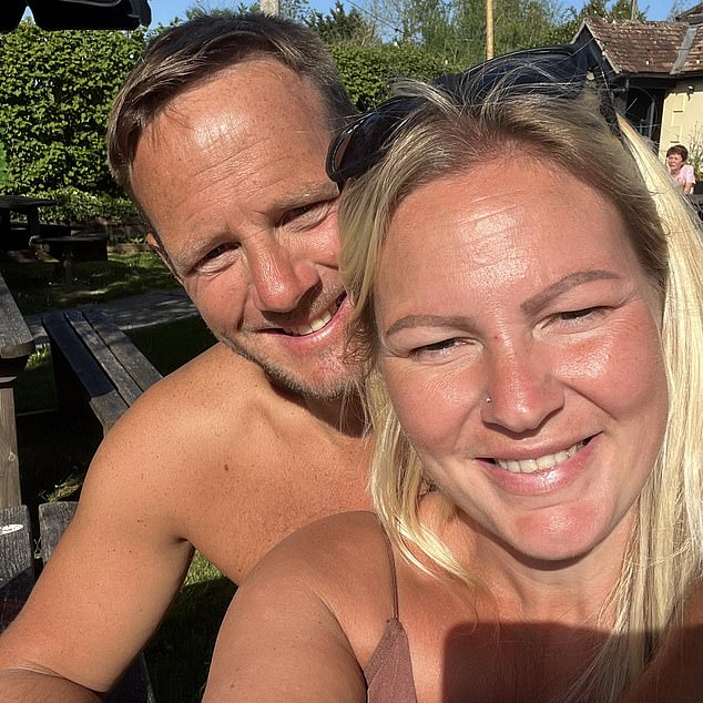 Tragic Oasis fan Lee Claydon is pictured here with his wife Amanda