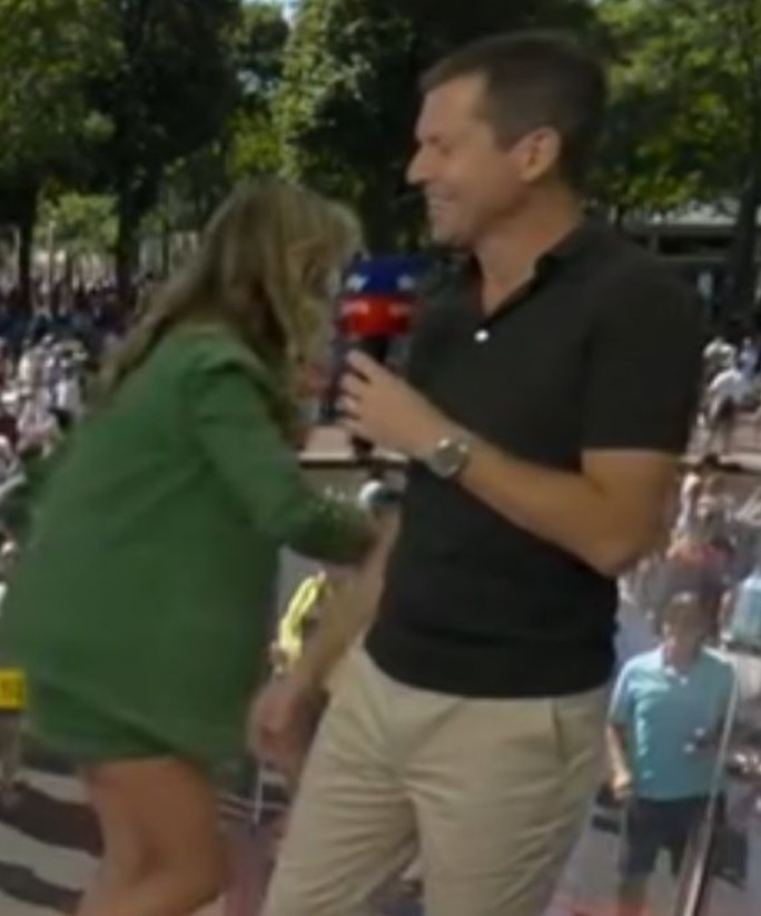 Two reporters conducting an interview.