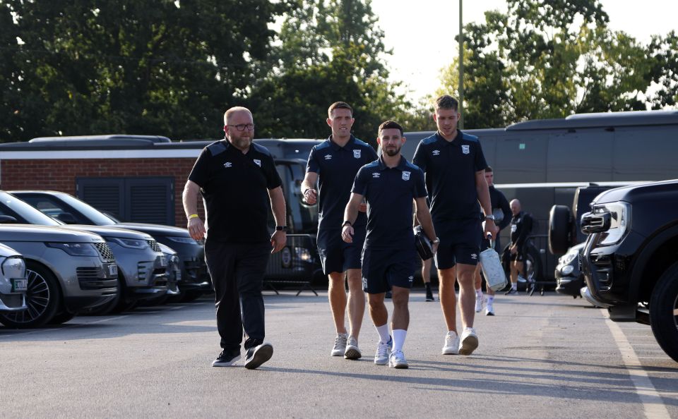 Ipswich Town players walking to the stadium.