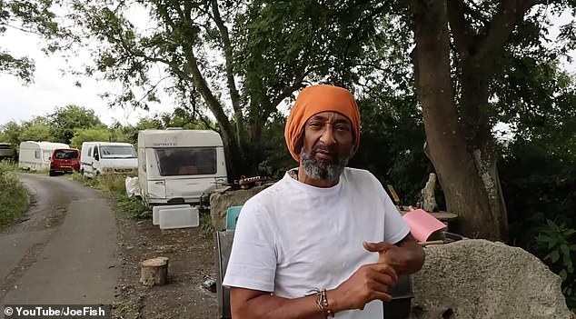 This is one of the village elders of a Glastonbury caravan commune proudly showing a YouTuber around his make shift squat of NINE years