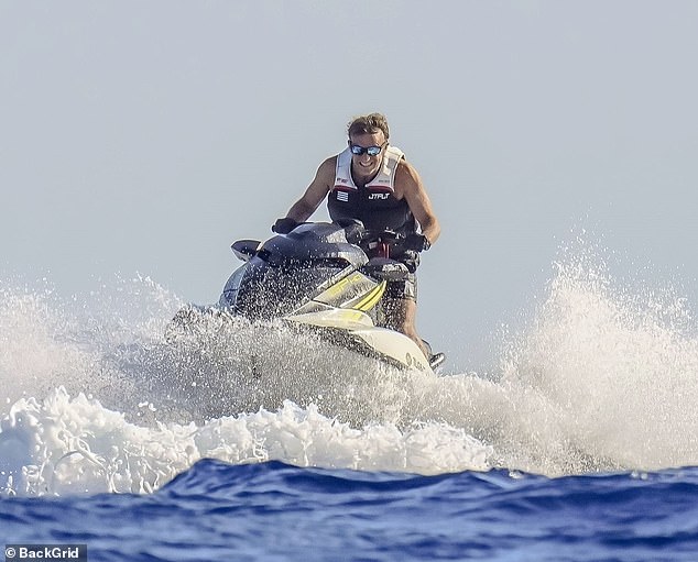 Macron has often been spotted ripping along the waves in recent years