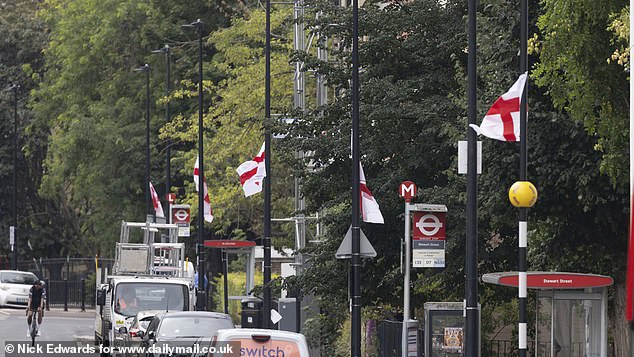 England flags flying from lampposts in Tower Hamlets this morning
