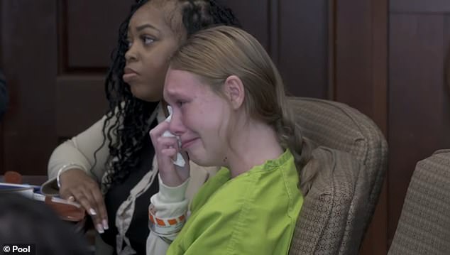 After settling in the courtroom beside her public defender, Latoya Williams (left), Patrick's smiles quickly gave way to tears as she was denied bail