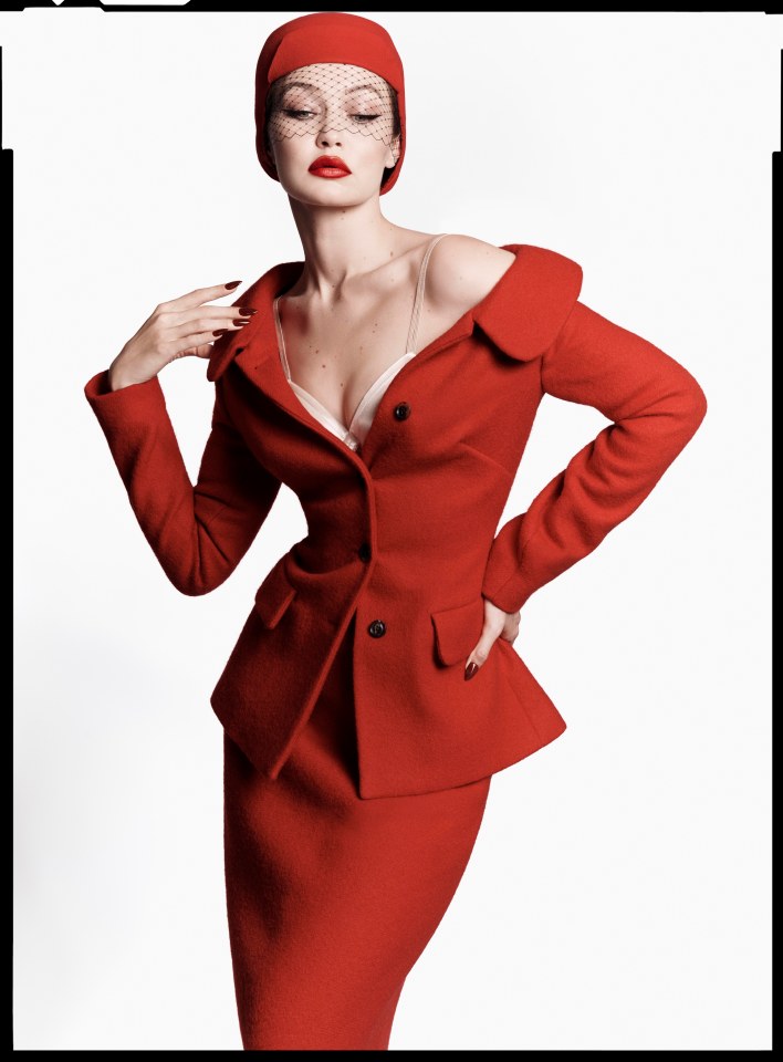 Gigi Hadid in a red suit and hat for V Magazine.