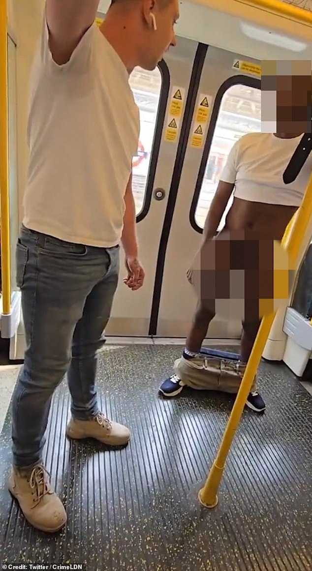 The moment a commuter confronts a man on the Tube after he dropped his trousers in a packed carriage