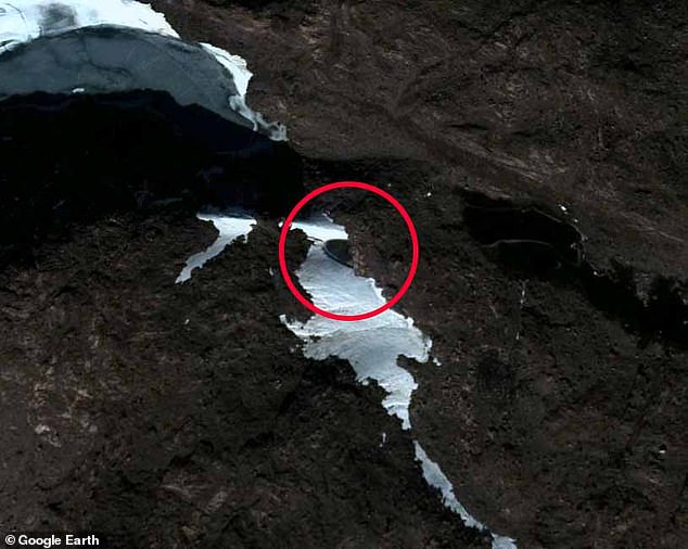 Whatever it is, the mysterious Oreo-like object looks rather out of place among the natural geology of Antarctica