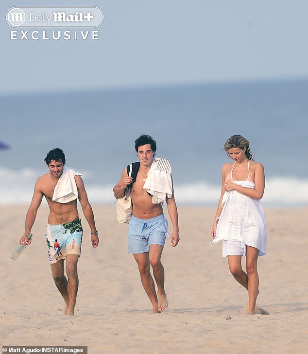 Her other friend was seen carrying an empty wine bottle