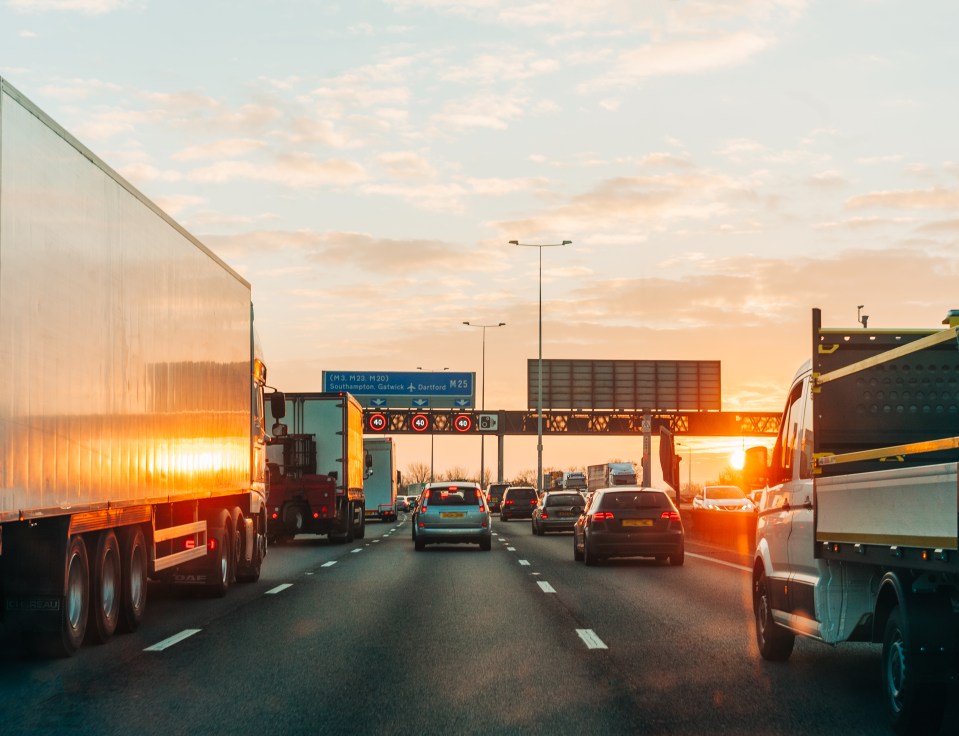 Traffic jam at sunset on a highway.
