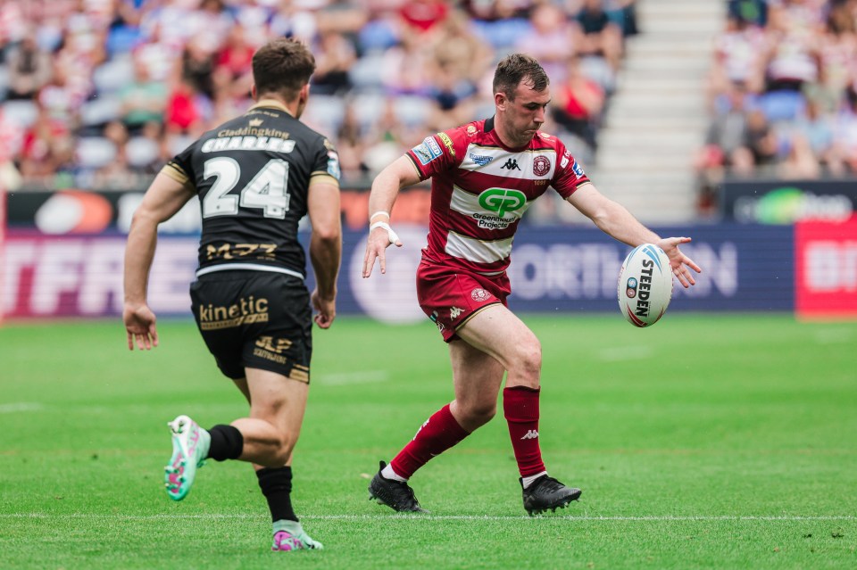 Rugby player running with the ball.