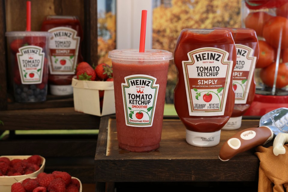 Heinz tomato ketchup smoothie next to bottles of Heinz ketchup.