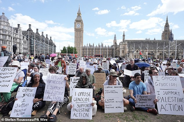 Militant protesters were accused of a 'colossal' waste of millions of pounds of taxpayers' money after more than 360 deliberately forced police to arrest them by brandishing signs supporting the outlawed group Palestine Action