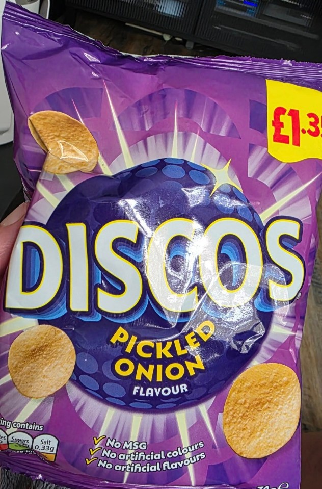 Bag of Discos pickled onion crisps.