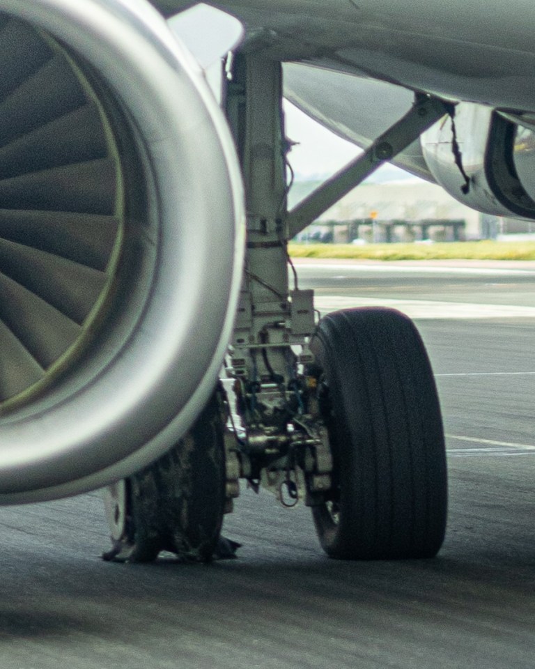 Story from Jam Press (Plane Tyre Terror) Pictured: The exploded tyre (left). VIDEO: Brit holidaymakers terrified after plane tyre explodes in freak one-in-10,000 take off accident A Brit family jetting home from a Mediterranean holiday were terrified after a plane tyre exploded in a freak one-in-10,000 take off accident. Kris Sadler was petrified when the blow out happened just as the plane was about to lift off. He videoed the shocking explosion and the scary vibrations it caused to the wing. Kris was returning from Corfu to Birmingham, with wife Katie and sons, Olly, 13, and Zach, 9. They were on a TUI jet when the nerve shredding blast happened. "It was scary," Kris, from Telford, Shropshire, told, Luxury Travel Daily. "There were bits of tyre flying everywhere. "The whole wing was rippling. "I knew something was wrong but the crew took two hours to tell us. "I don't blame them - the crew were brilliant. "The pilot was good - thank goodness we had a pilot who trains other pilots. "He told us he was handing over to his co pilot to fly us home. "But later he told us he would be landing because we'd lost a tyre. "He said the plane was a hundred per cent safe but passengers had to take precautions and go into the brace position. "And as we came into touch down the crew were saying, 'heads down, heads down, heads down' repeatedly which kind of makes you panic more. "It was pretty crazy. "It's a one-in-10,000 chance of a plane tyre blowing - so that's mine tocked off. "It's probably never going to happen again." The photographer added that emergency crews were prepared when they landed at Birmingham. "They hosed down the broken wheel," he said. "It looked like there were sparks when we landed but the landing was very good. "It was a bit bumpy because it was running on a flat tyre. "But it has other tyres so I suppose we knew we'd be OK. "I was just trying to hold it together for the kids - and my wife was trying to hold it together. "And she did until we landed and then it all came out. "I was saying to them, 'it's all ok' but I was thinking, 'bloody hell if this goes wrong'. "I didn't know if there was more damage to the landing gear - and nor did the crew. "But the pilot lowered the landing gear 15 minutes before we were due to land and I know they never do it that early. "Then a black military jet appeared next to us and flew all the way in to landing with us. "It had come to scout out the landing gear and tyre to see if it was OK. "All the passengers cheered and clapped when we landed. "The pilot came out and bowed. "I don't know how dangerous it really was. "We may never have been in danger - or it might have been very dangerous and the pilot just pulled it off. "There were some tears - but it was great to get back on solid ground and all safe." TUI has been approached for comment. ENDS EDITOR'S NOTE: Video Usage Licence: (NON-EXCLUSIVE) We have obtained a non-exclusive licence from the copyright holder. A copy of the licence is available on request. Video Restrictions: None.