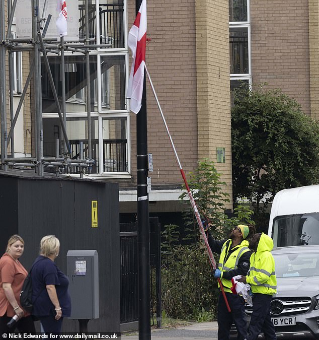 Tensions bubbled over in Tower Hamlets yesterday when, around midday at Marsh Wall on the Isle of Dogs, a two-man team from the council spent several hours cutting down Union and St George flags