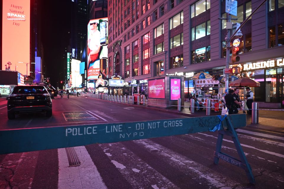 Police barricade in Times Square following a shooting.
