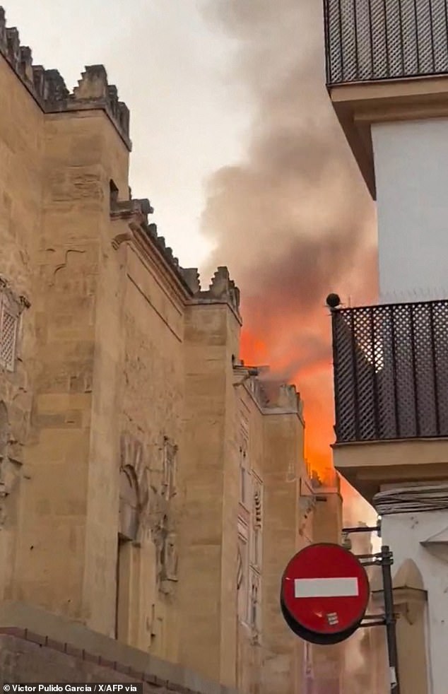 A huge blaze tore through an ancient Spanish church as firefighters battled to save the building from ruin