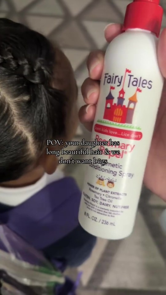 Fairy Tales Rosemary Repel conditioning spray bottle and a child with long braided hair.