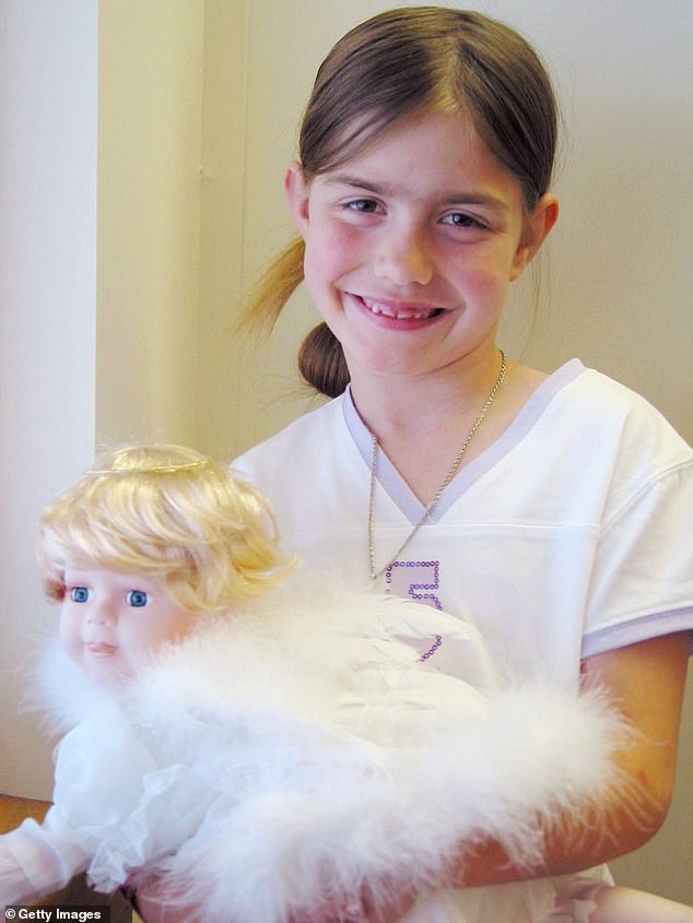 In this handout photo provided by the Kootenai County Sheriff's Department, 8-year-old Shasta poses for a photograph at the Kootenai Medical Center July 4, 2005 in Coeur d' Alene, Idaho after she was rescued
