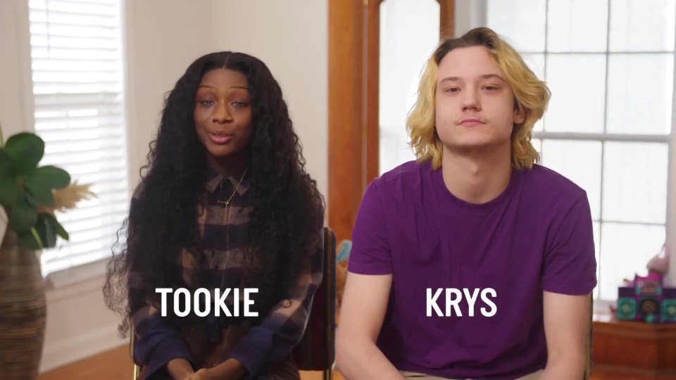 TooKie and Krys, seated together.