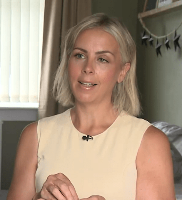 Woman with blonde hair speaking.