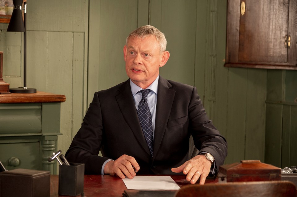 Martin Clunes as Dr. Martin Ellingham.