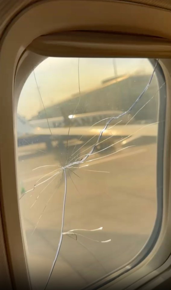 Cracked airplane window.