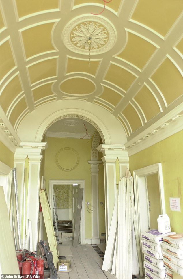 Photos of the 2001 renovation of Forest Lodge revealed a grand half-barrel vaulted hallway ceiling was also shown as well as ornate ceiling decorations
