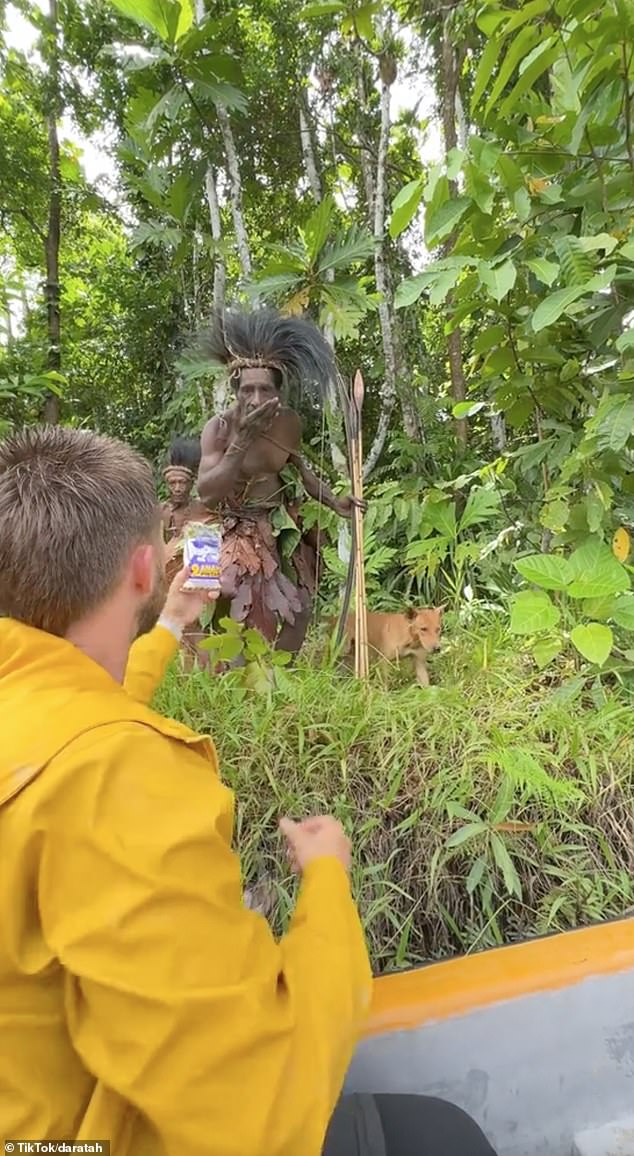 In an attempt to 'make an offering' so that their group is welcomed, Tah took out packets of salt to give to the tribesmen