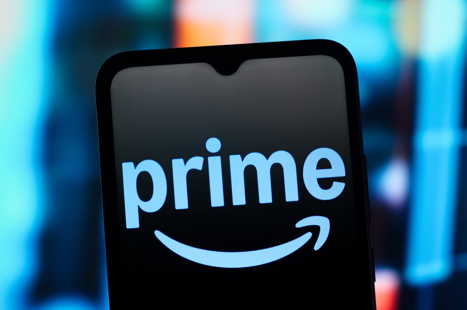 Photo illustration of the Amazon Prime logo on a smartphone screen.