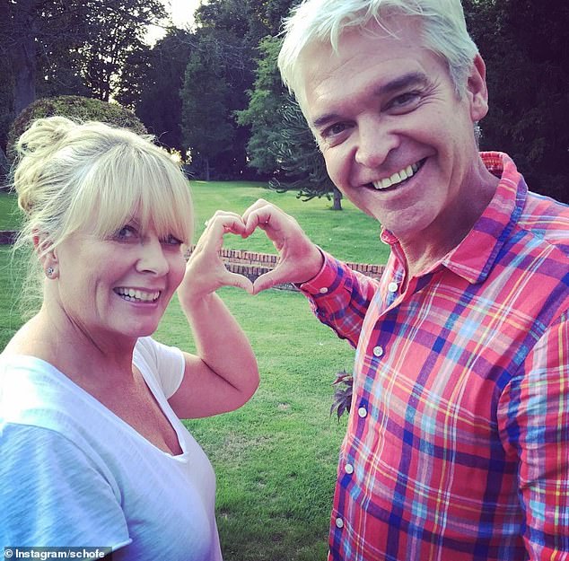 A growing number of celebrity couples are choosing not to divorce, despite being separated, including Phillip Schofield and wife Stephanie Lowe (pictured)