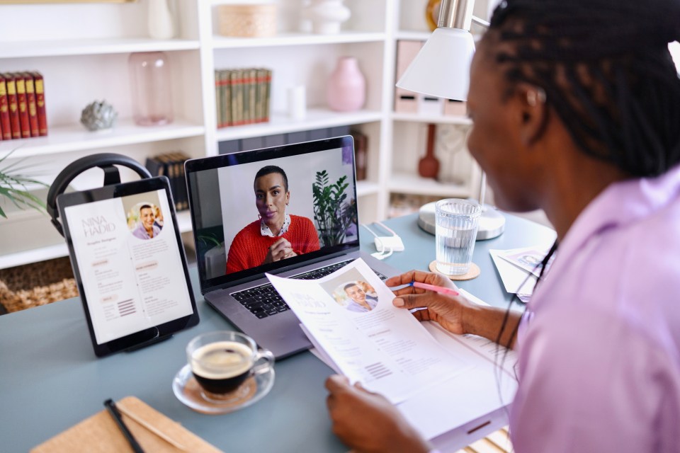 Woman conducting a virtual job interview.